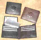 Bi-fold flip up ;eather wallet with natural debossed symbol